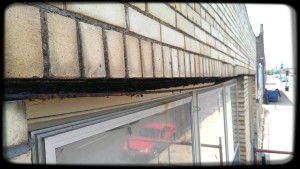St. Louis Steel Lintel Needing Replacement. Rusted and displacing the surrounding brick.